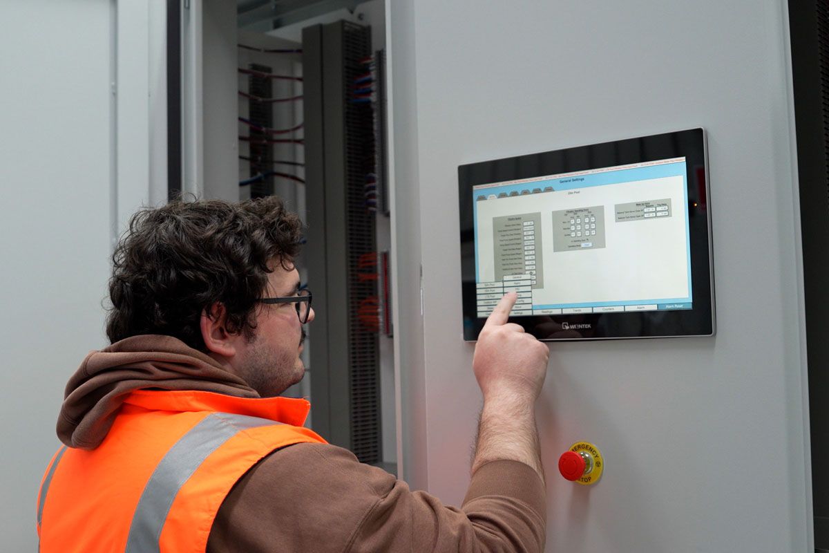 Metroid automation engineer working on PLC programming