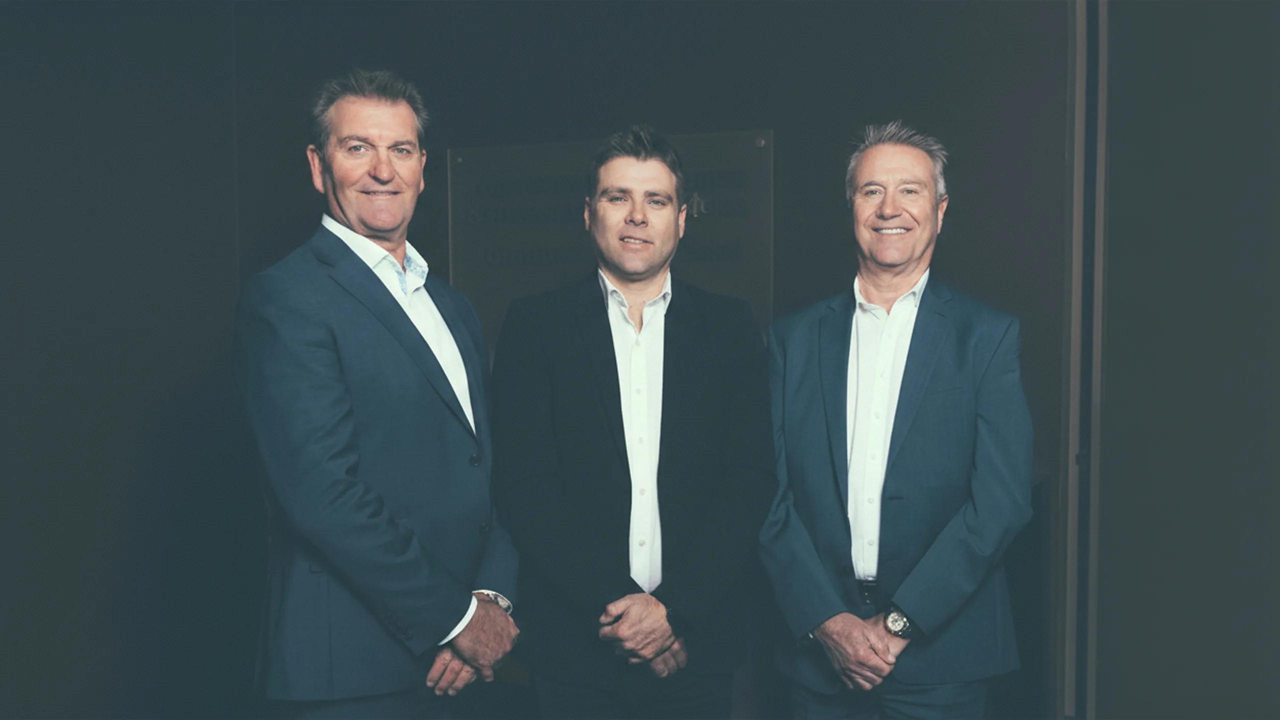 A photo of the 3 owners of Agnew Financial Group.