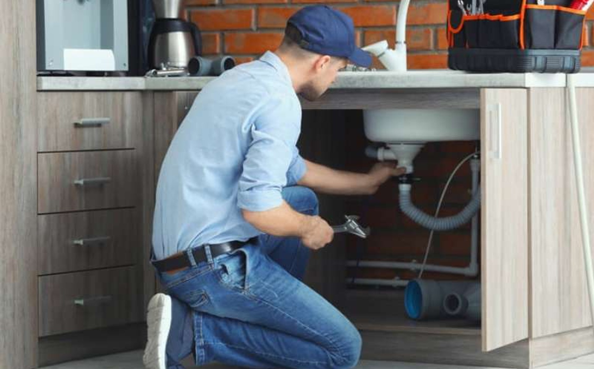 Skilled handyman repairing a house interior with professional tools