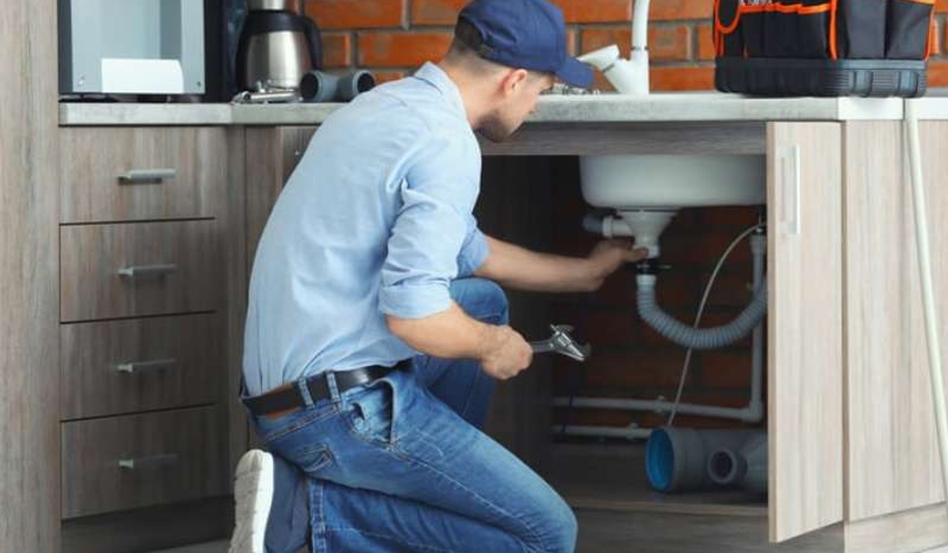 Skilled handyman repairing a house interior with professional tools