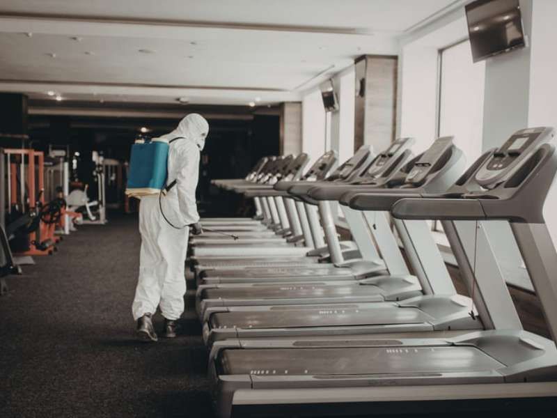 Modern fitness centre interior with stationary bikes and cardio equipment