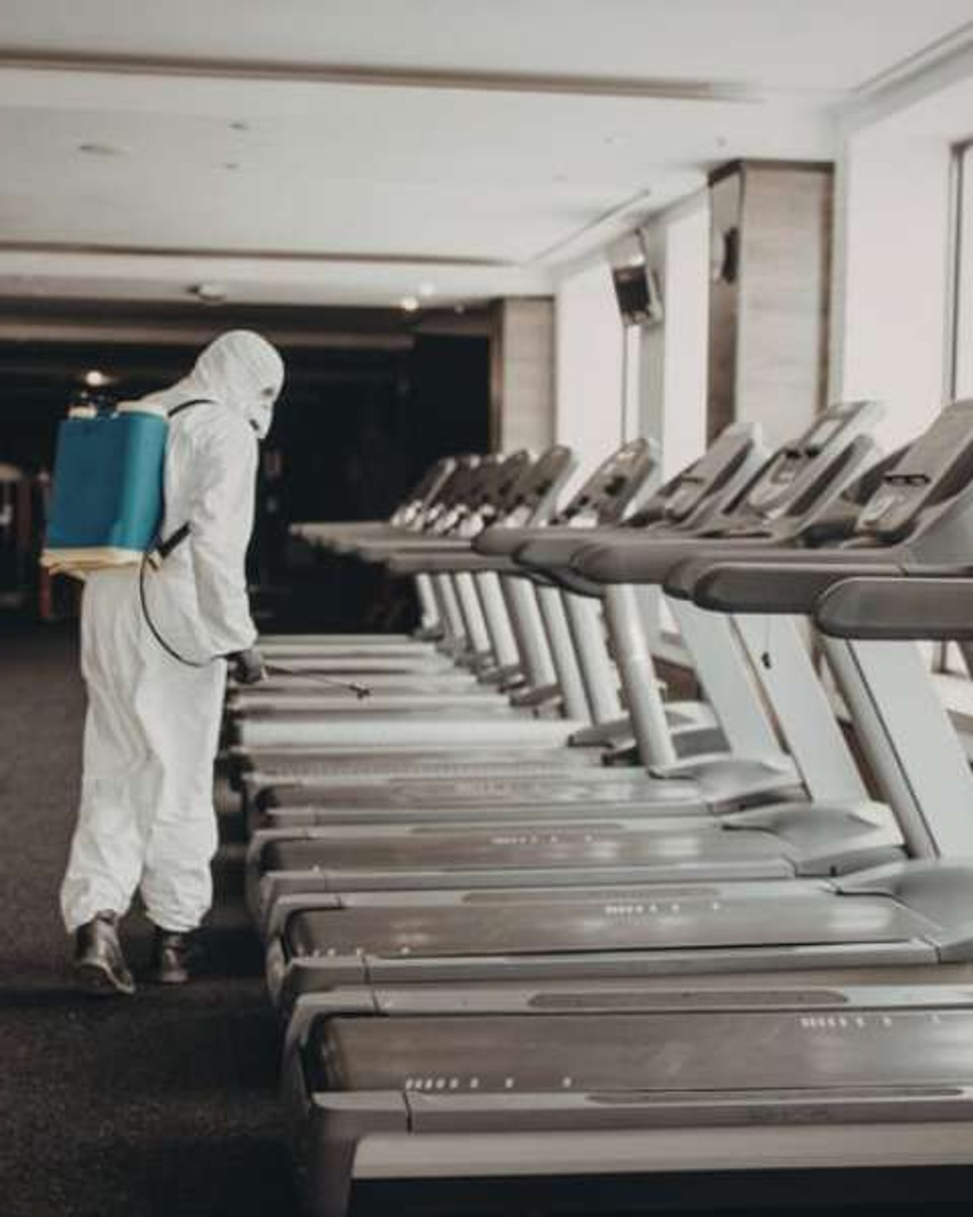 Modern fitness centre interior with stationary bikes and cardio equipment