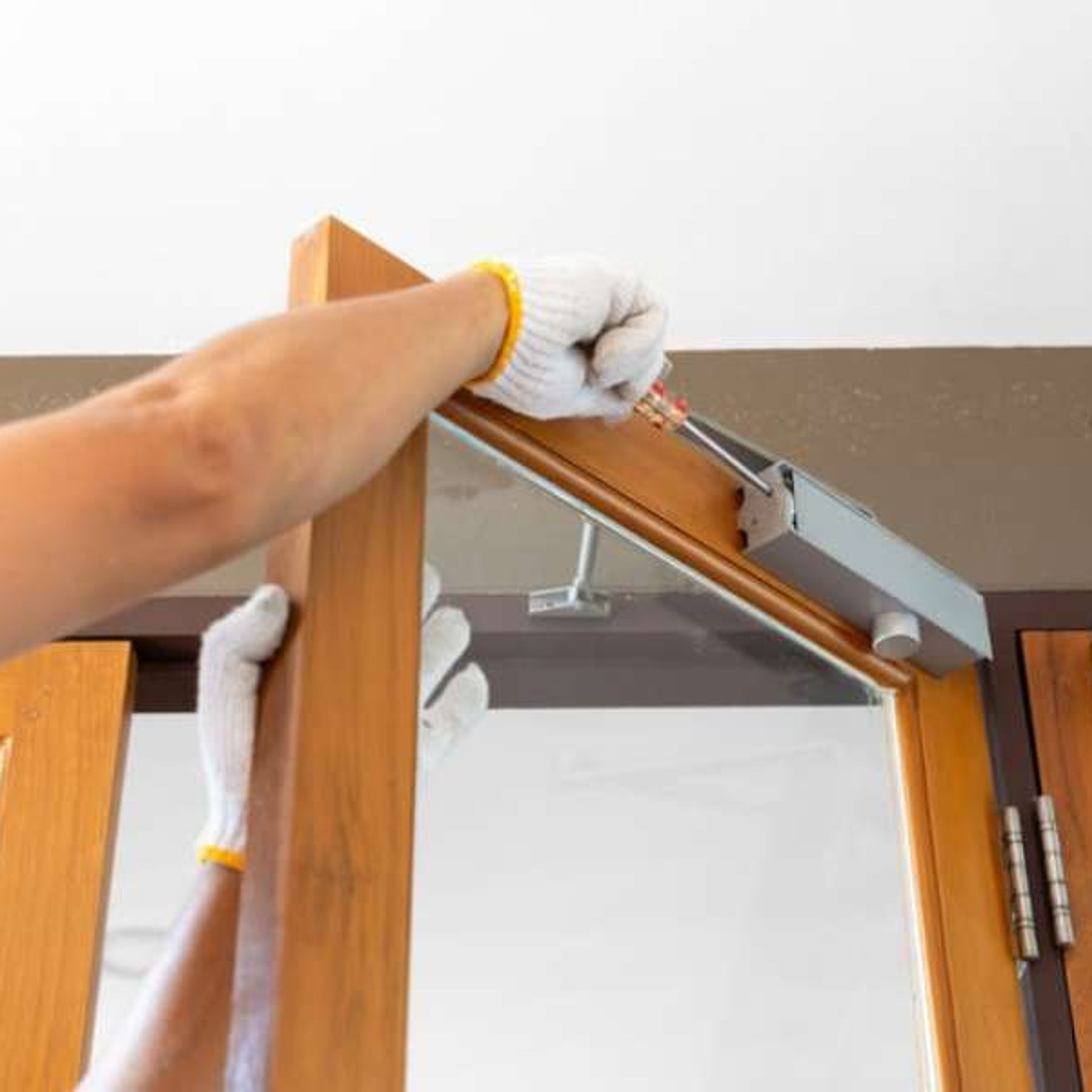 Carpenter at work with hammer and chisel