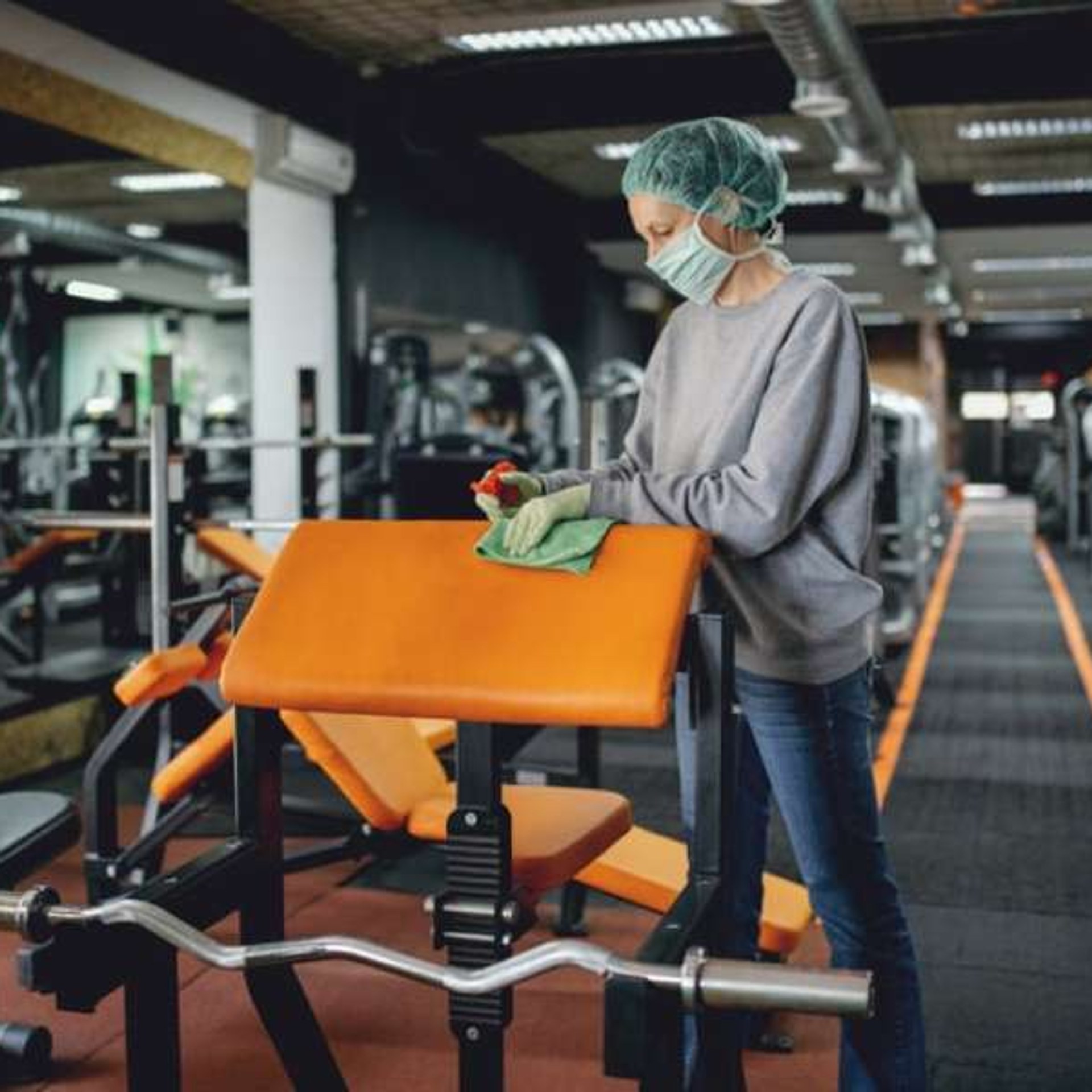 Professional Melbourne cleaner at work in office