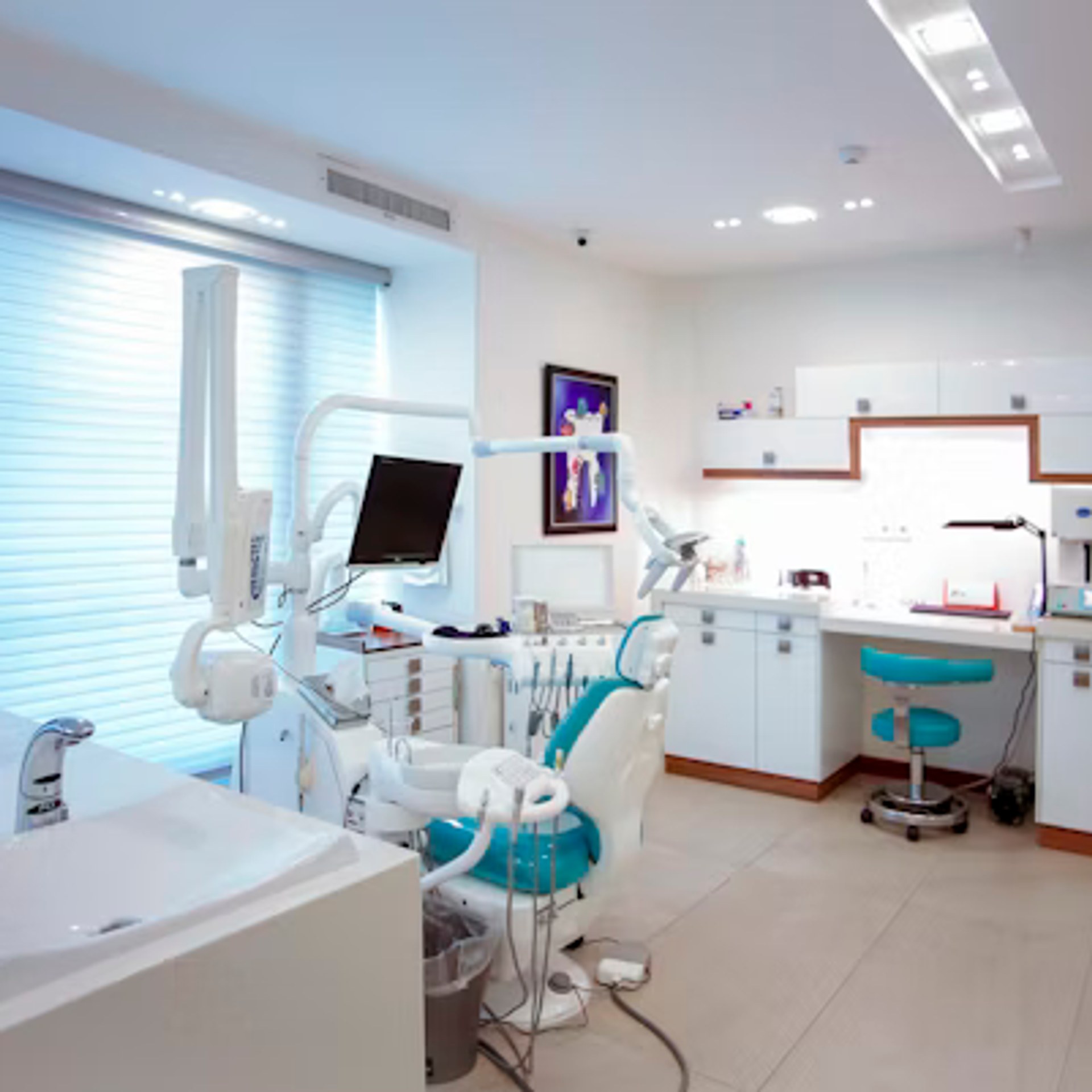 Modern clean dental clinic with chair and equipment