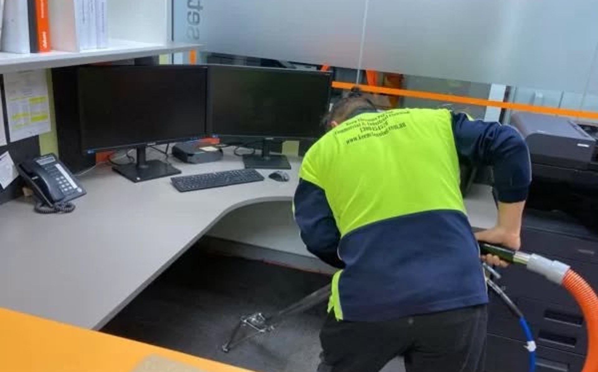 Office carpet being professionally steam cleaned