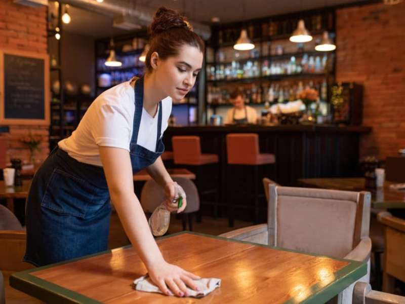 Set tables in an elegant empty restaurant ready for service