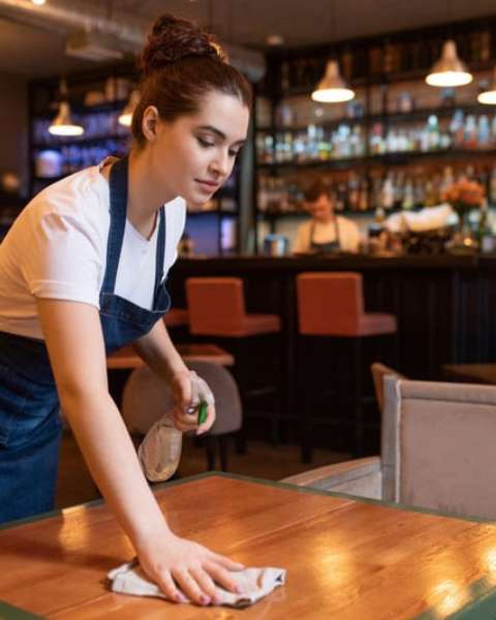 Set tables in an elegant empty restaurant ready for service