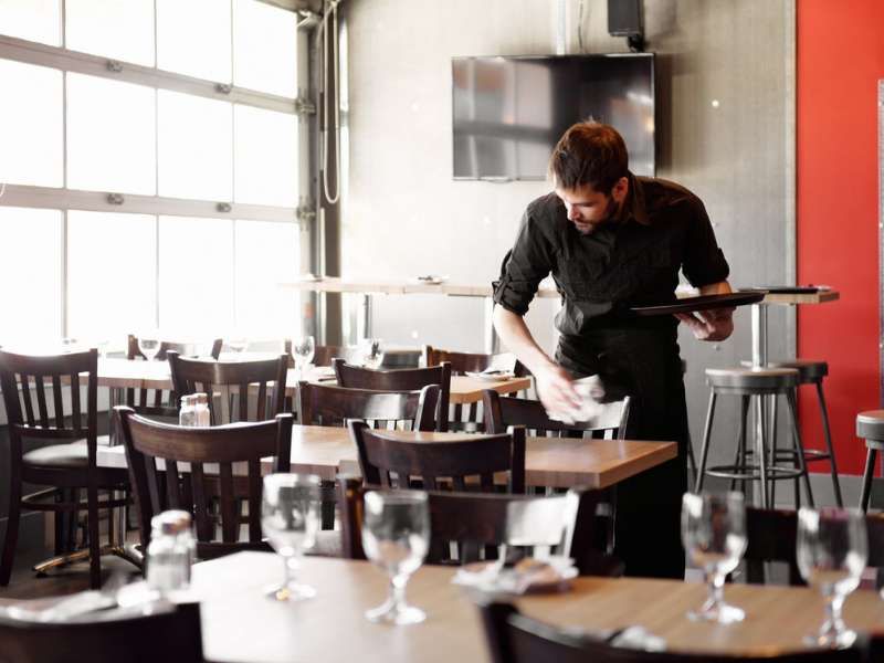 Cozy modern restaurant interior with warm ambient lighting