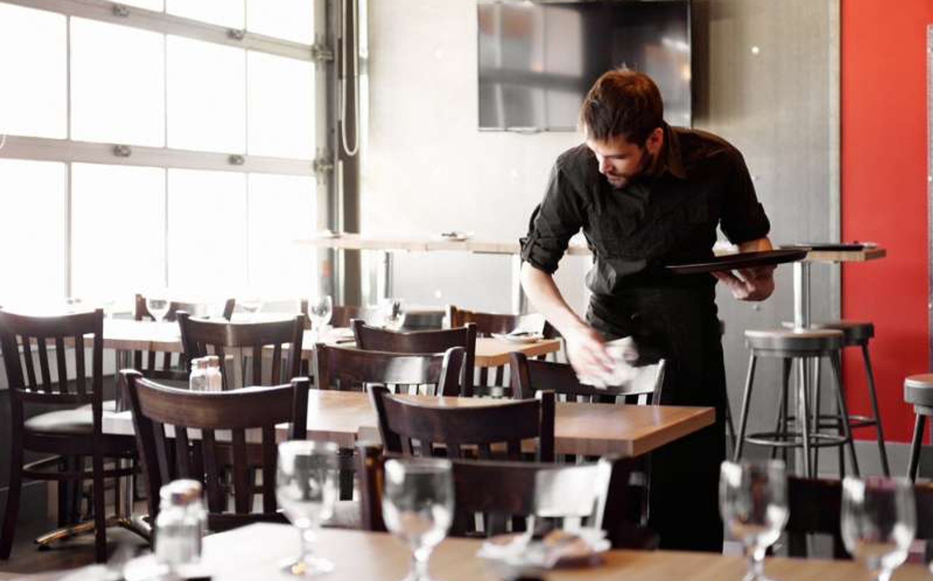 Cozy modern restaurant interior with warm ambient lighting