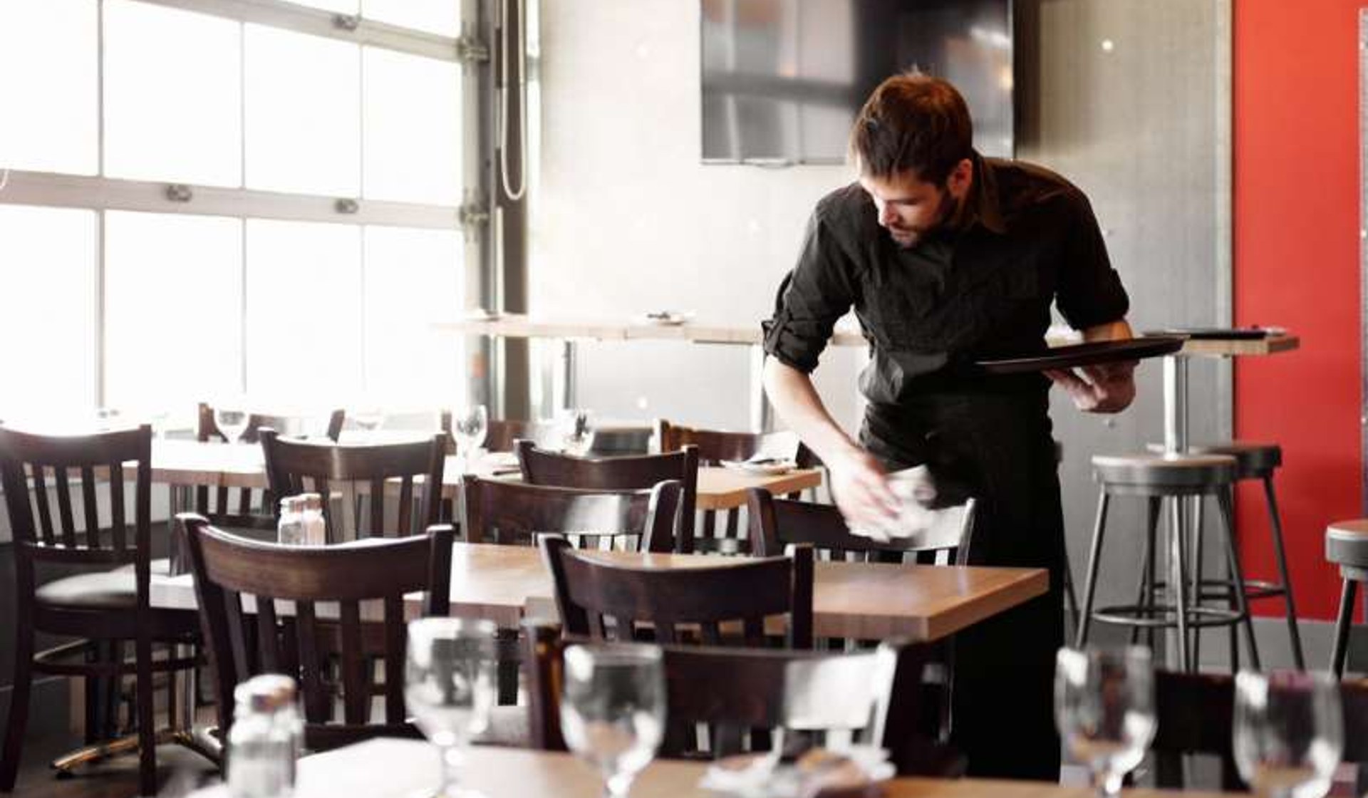 Cozy modern restaurant interior with warm ambient lighting