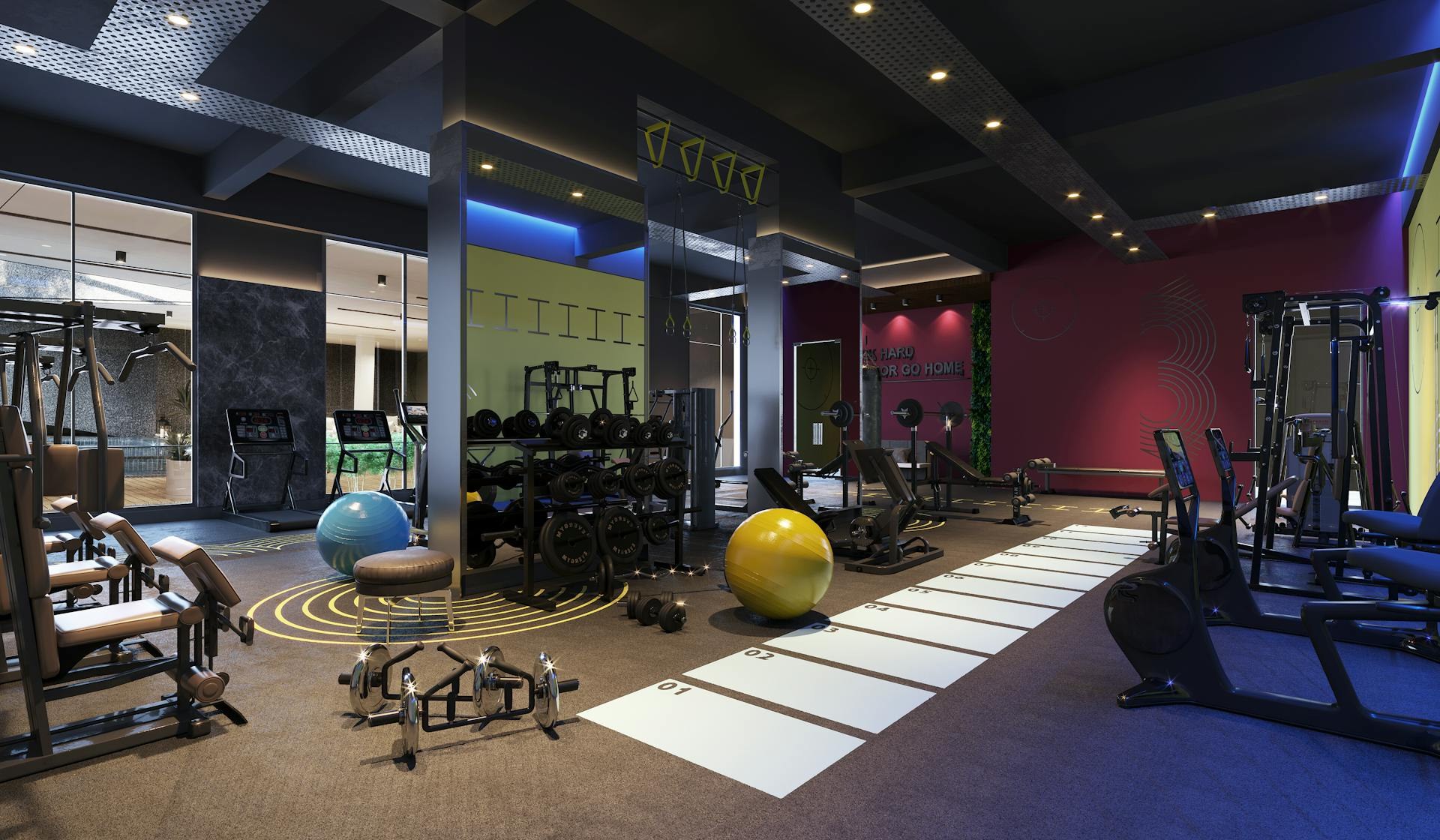 Modern fitness centre interior — spacious gym with cardio equipment and weights