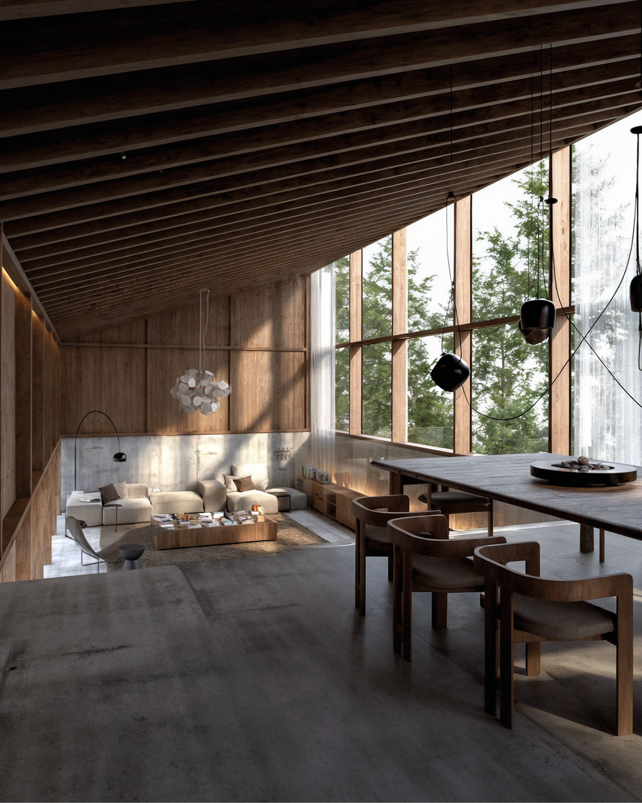 Estar y comedor de C15 con techo de madera inclinado y ventanales hacia el bosque.
