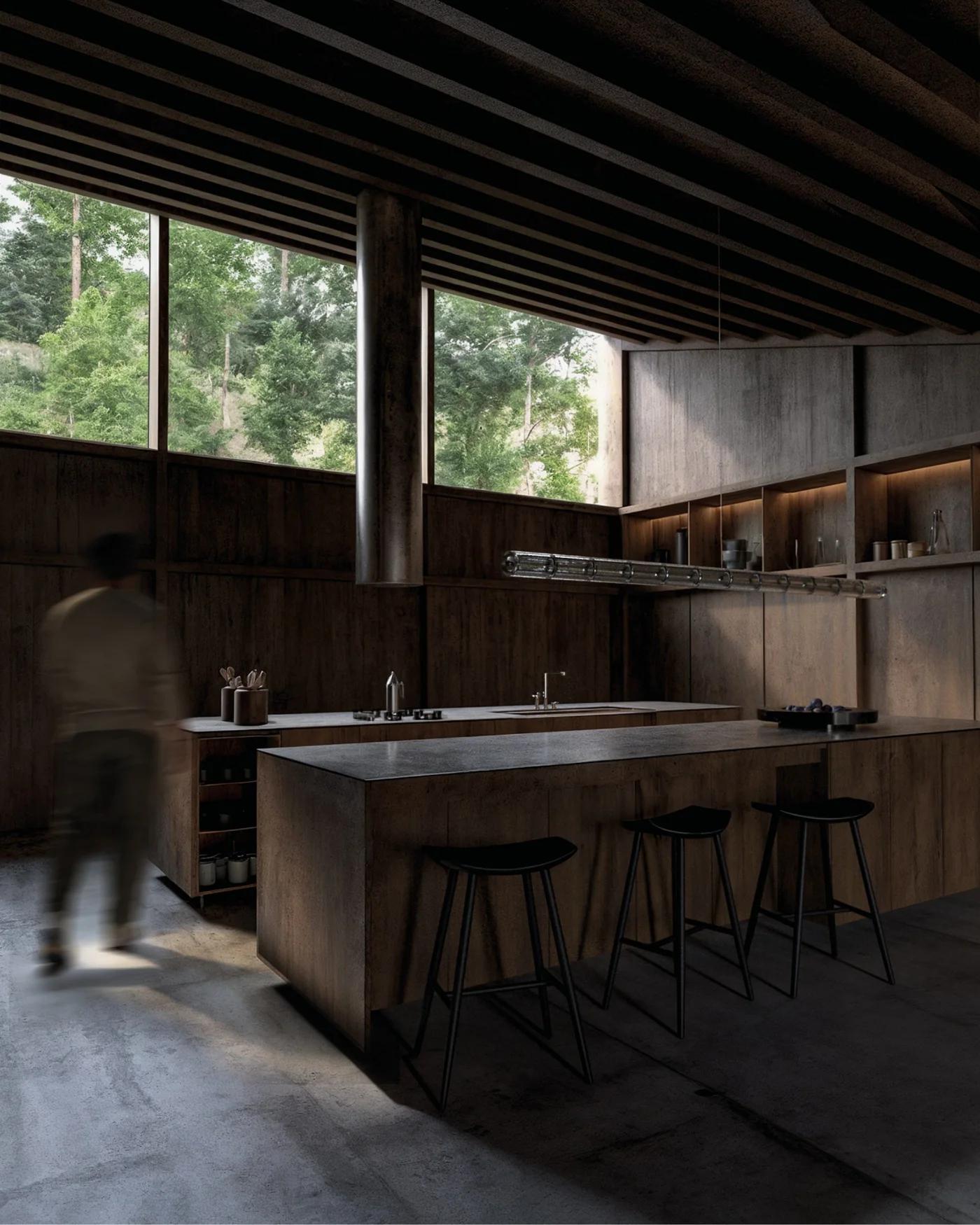 Cocina de C15 con isla de madera y vistas al jardín.