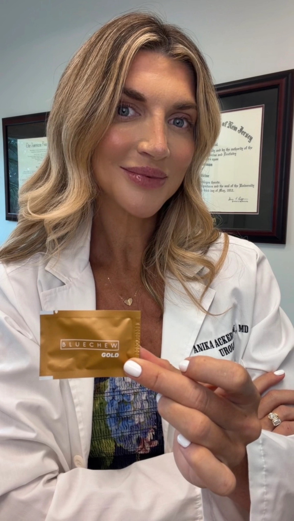 dr anika ackerman urologist holding bluechew gold