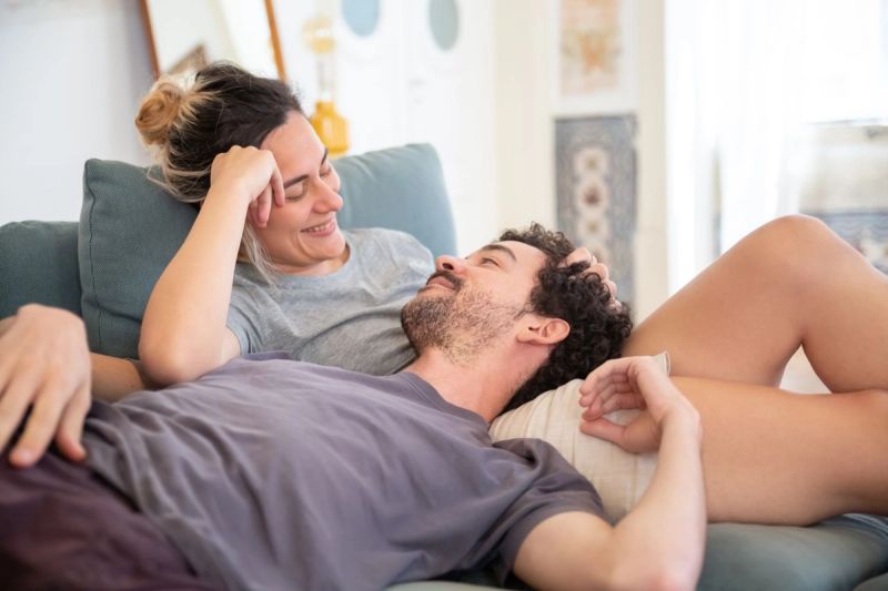happy couple on couch
