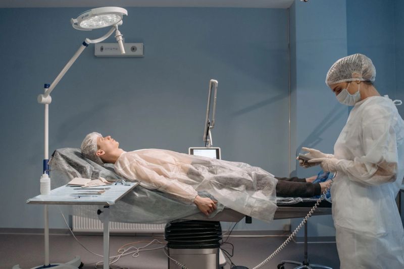 surgeon and patient in surgery room