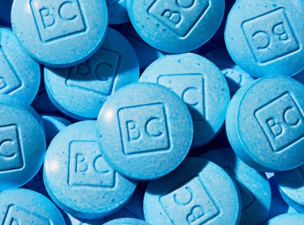 bluechew sublingual tablets piled with "BC" imprint