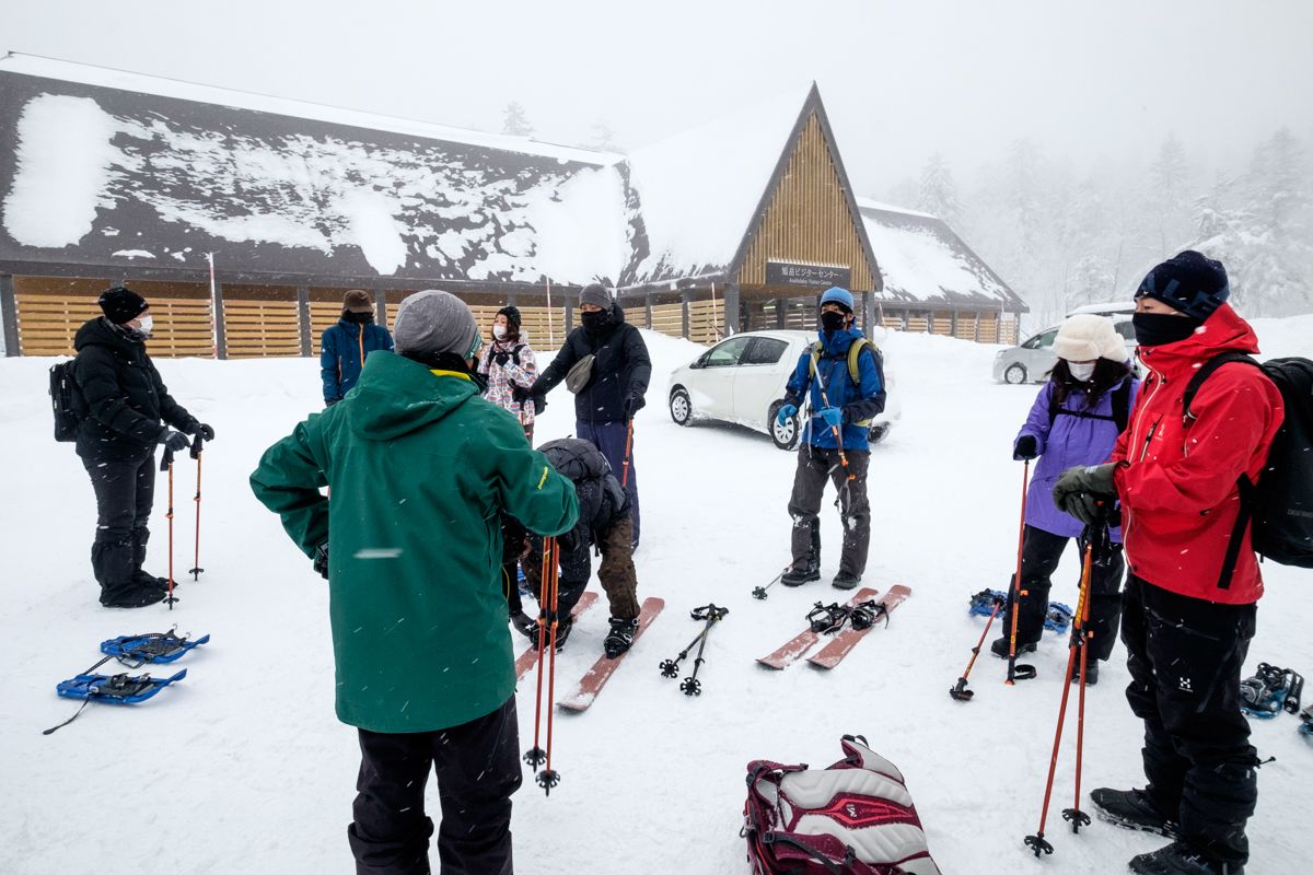Gearing up in snowshoes at Asahidake Visitor Centre