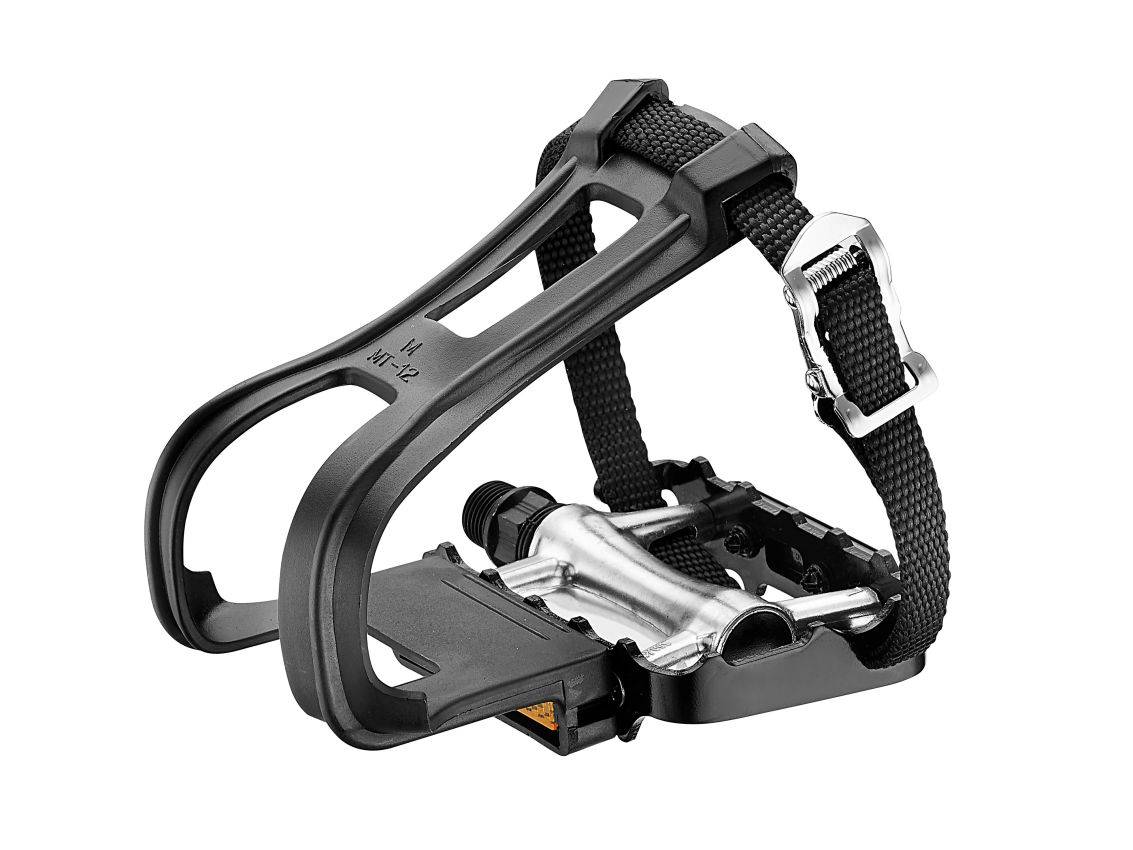 A close-up studio shot of a silver bike pedal equipped with a black plastic toe cage and an adjustable black nylon strap, isolated against a white background.