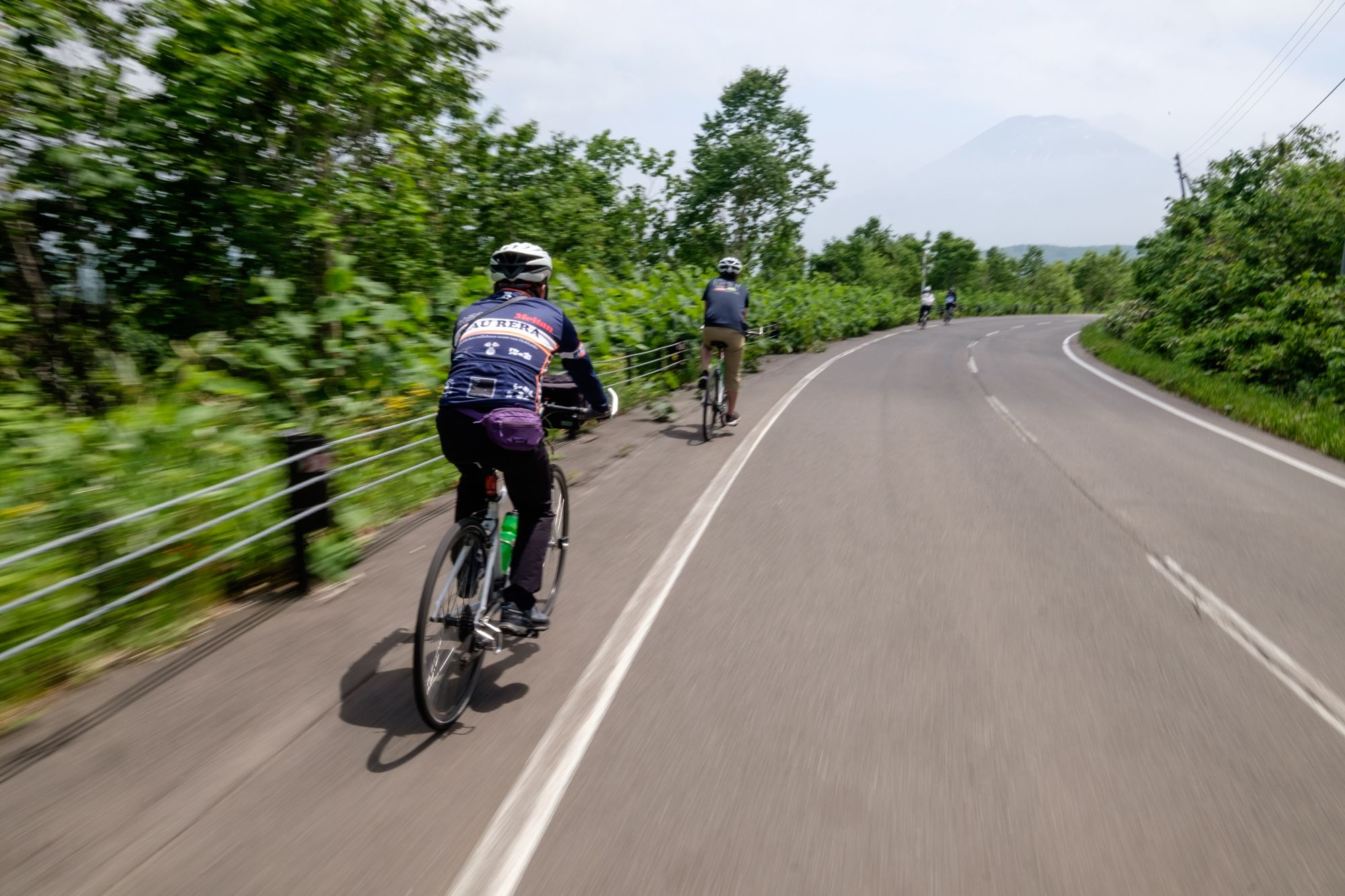 Enjoying the views of Mount Yotei during a fast downhill section