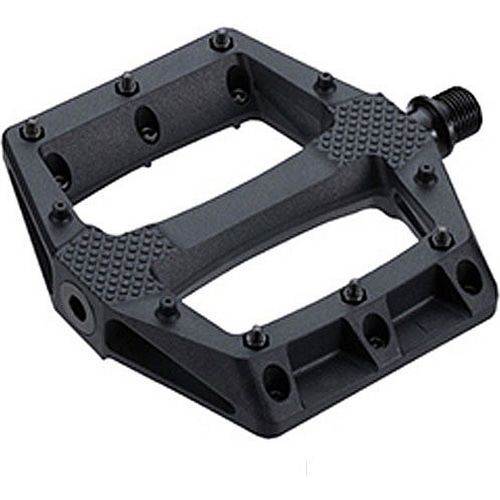 A flat bike pedal with pins to provide traction