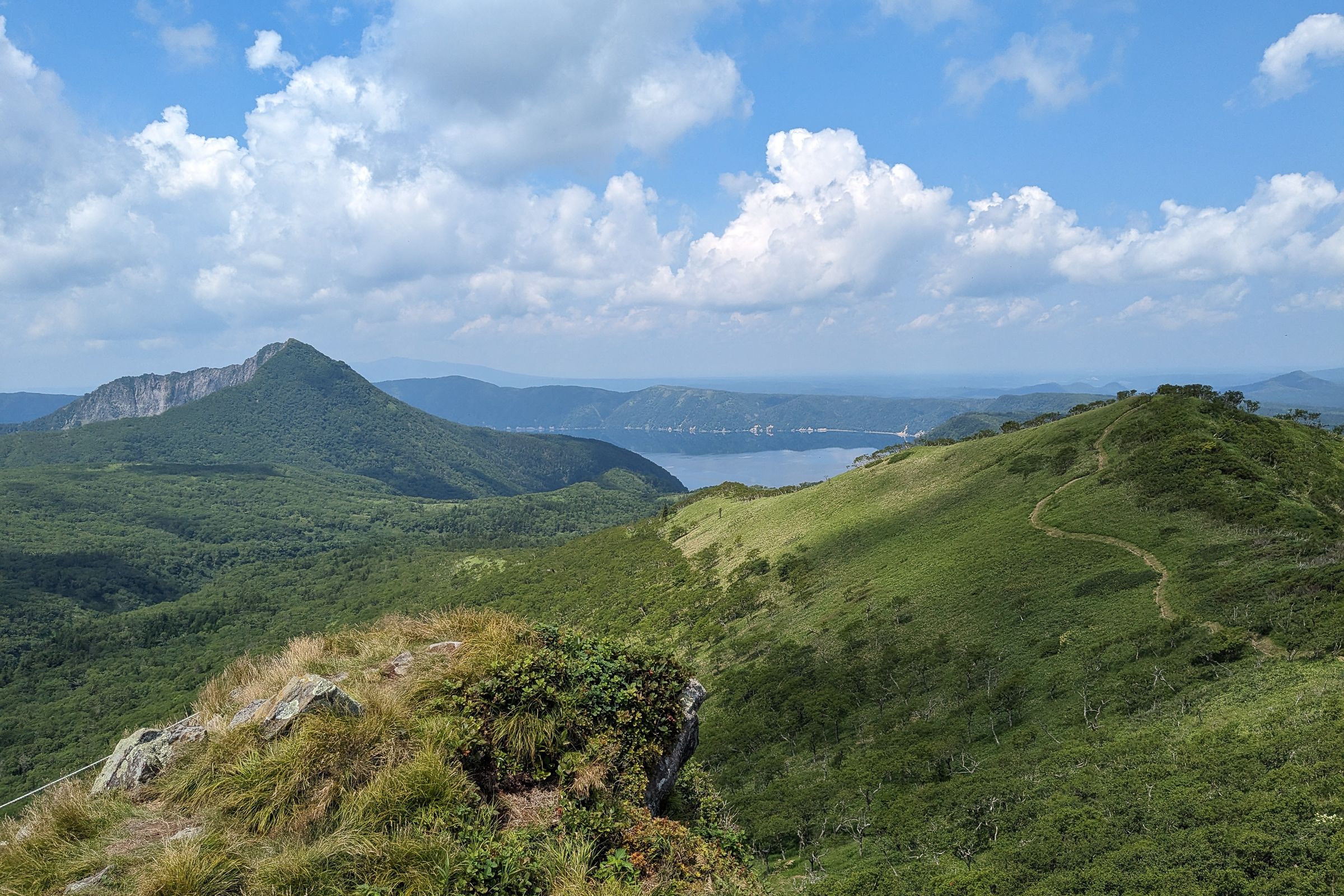 The traverse enjoys excellent views of Mt. Mashu and Lake Mashu on a clear day.