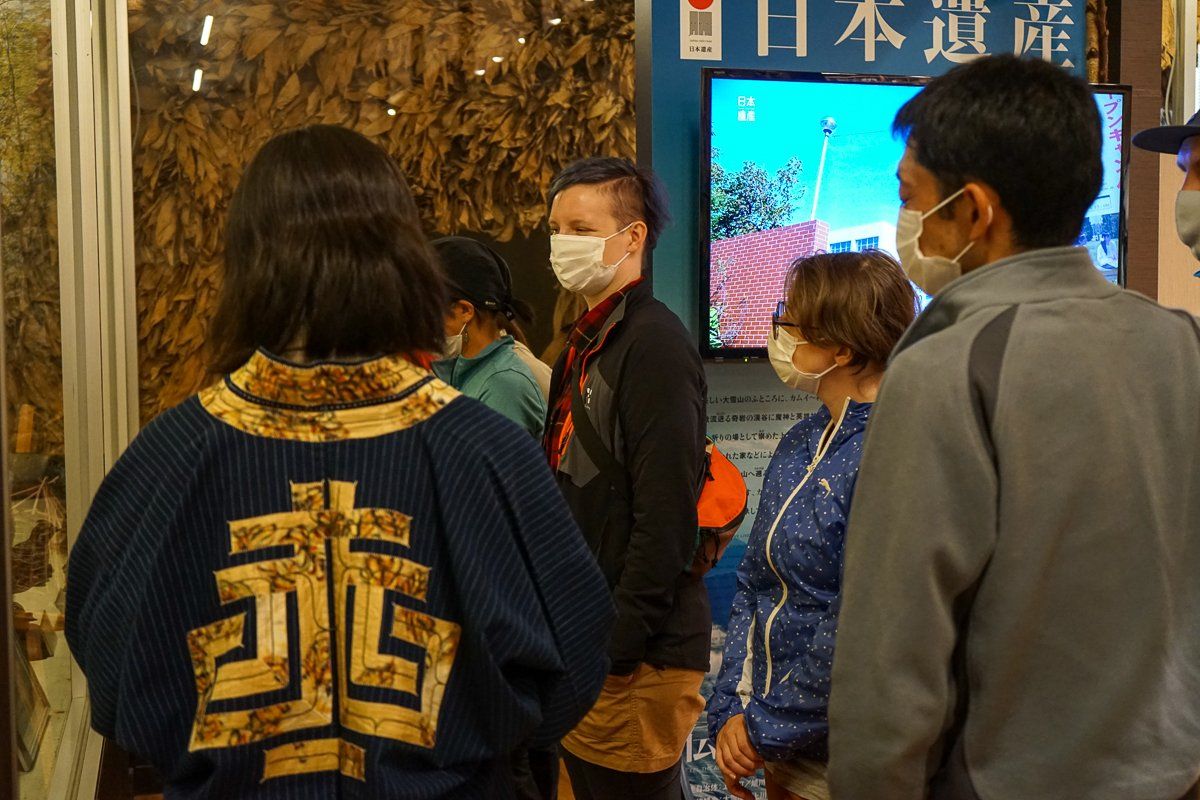 Guests, Host and Guide helping with English interpretation