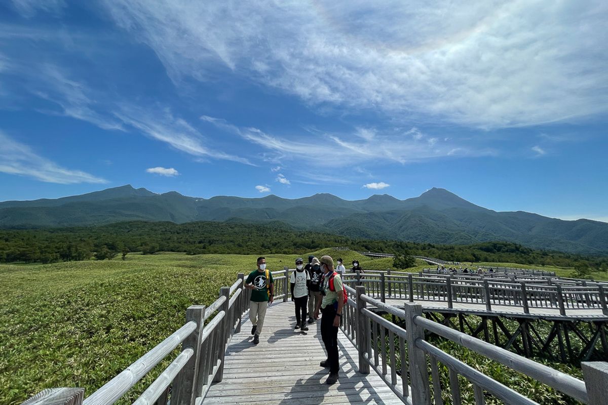Sightseers walk along Shiretoko's Five Lakes boardwalk.