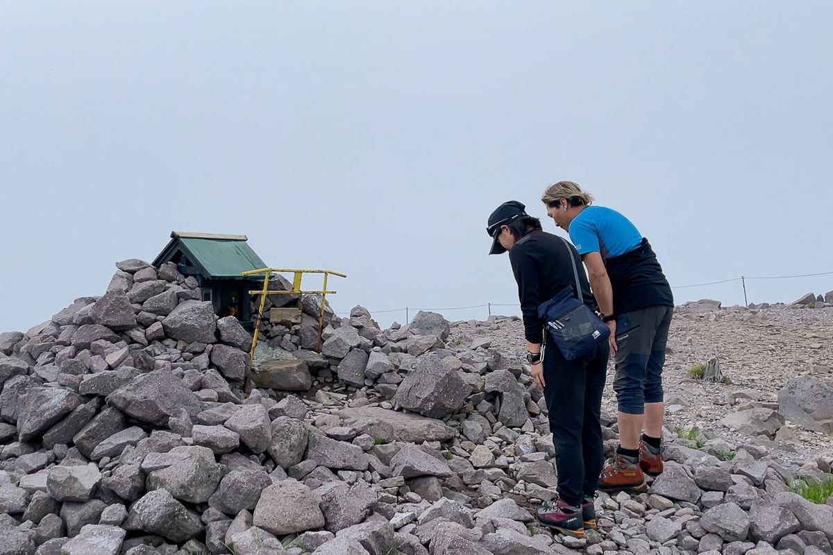 Hokkaido mountain guides at a shrine in Daisetsuzan National Park