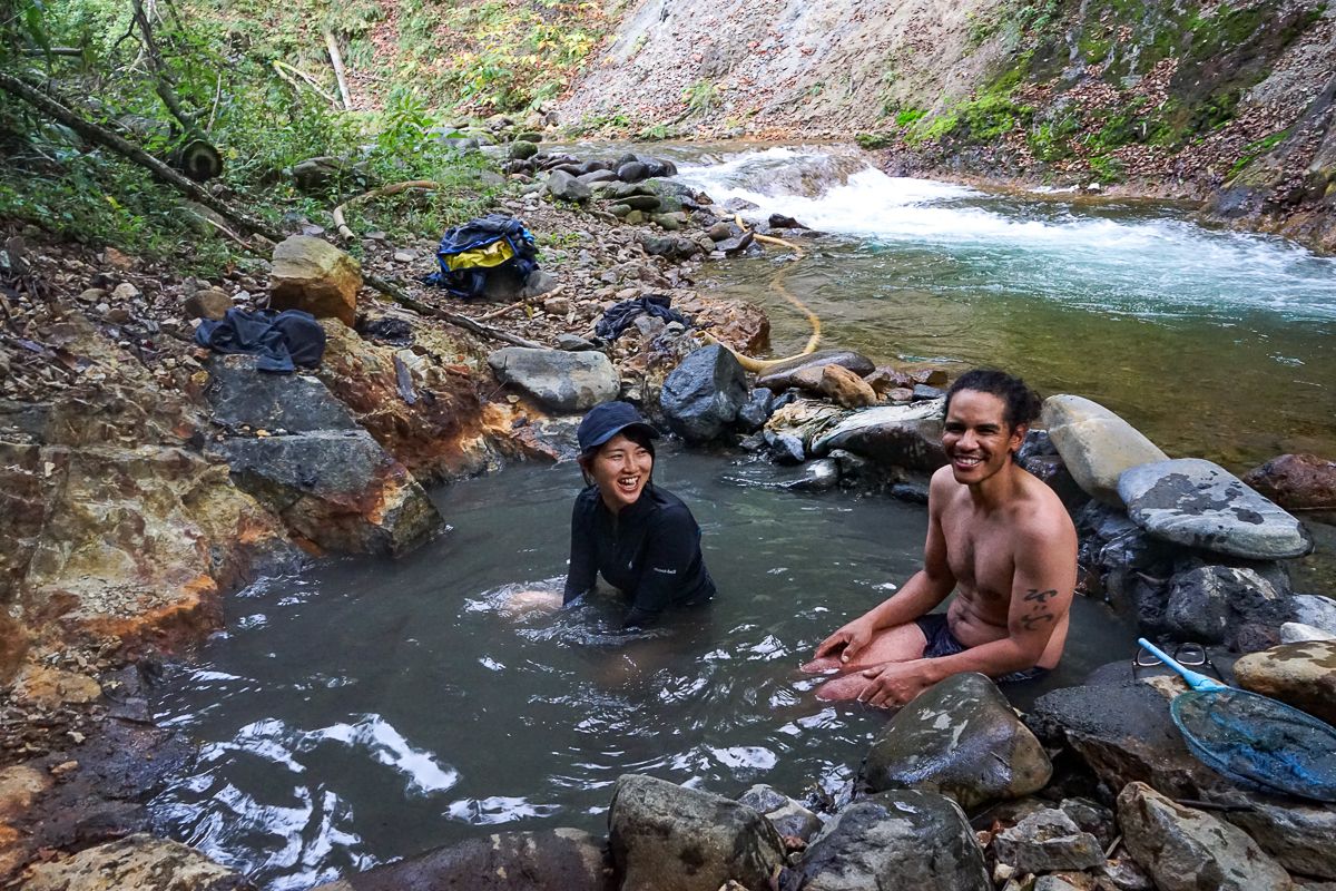 Hikers enjoying a Hokkaido back country onsen