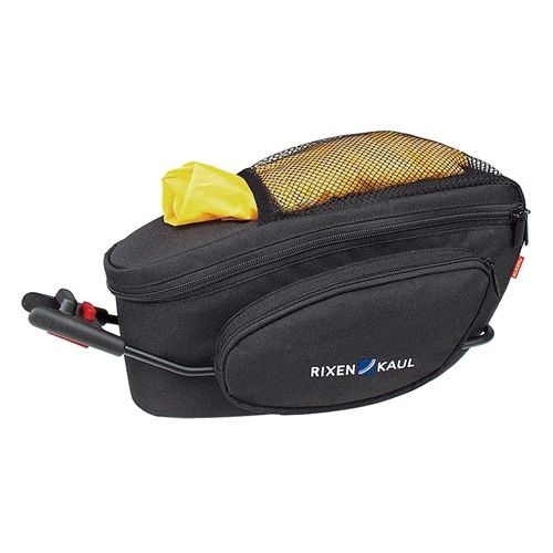 A black Rixen Kaul handlebar bag is shown with a yellow rain cover stashed in a mesh pocked on the top.