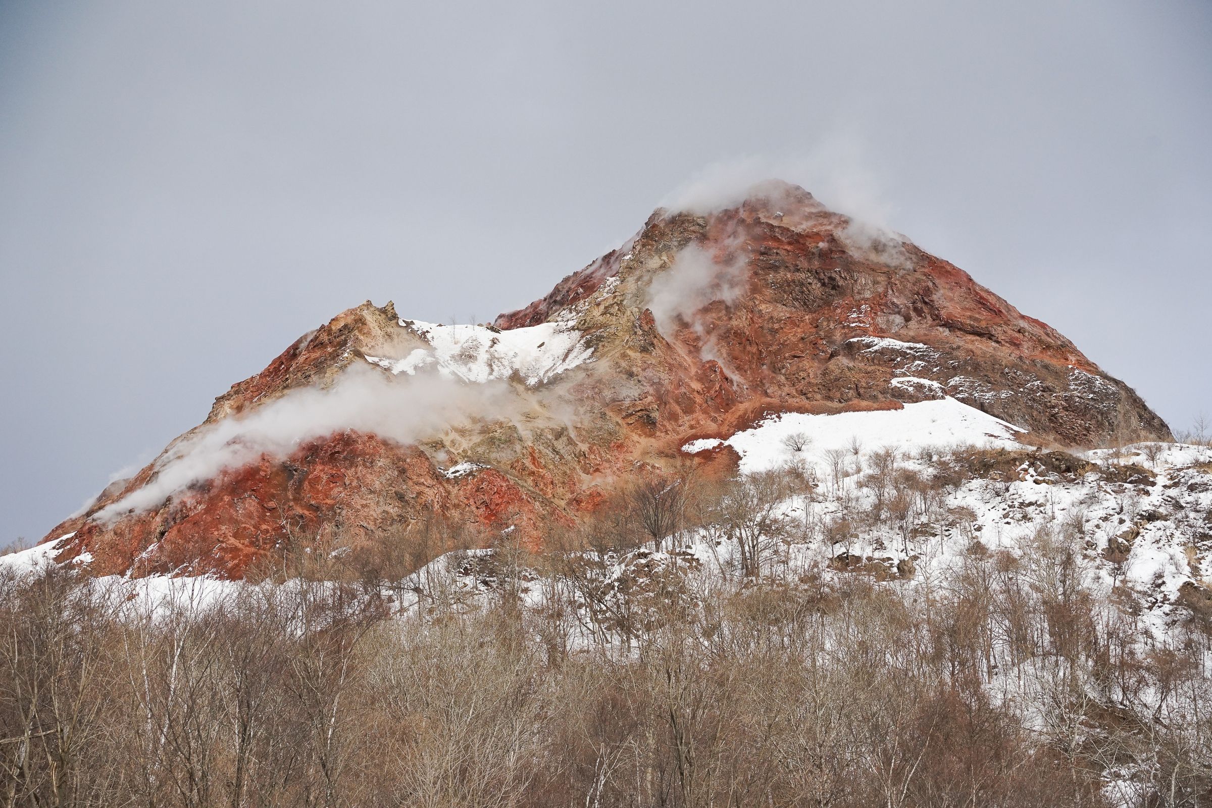 The volcanically active peak of Showa-Shinzan, complete with steaming craters!