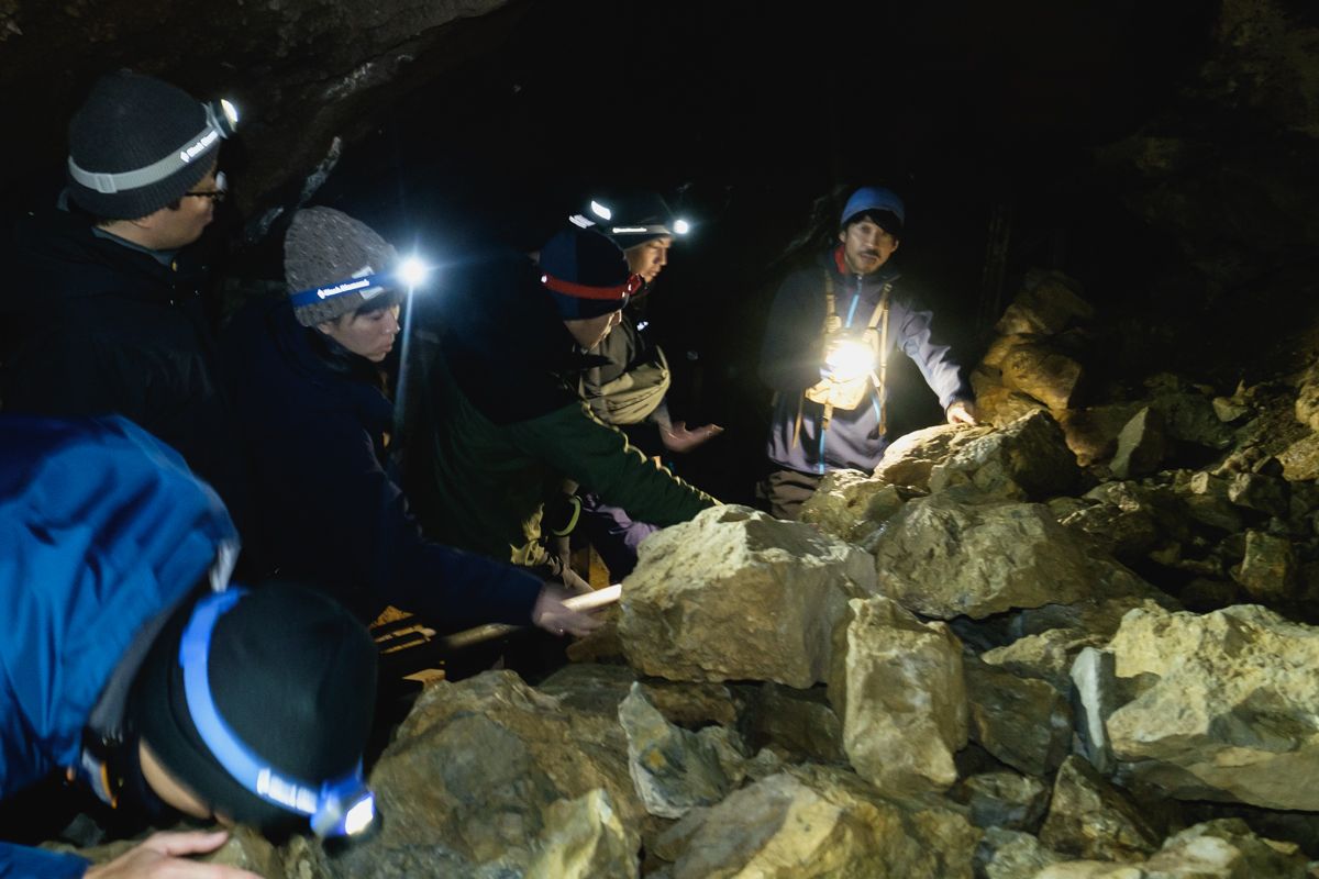 Observing the rocks inside the Toma Limestone Cave
