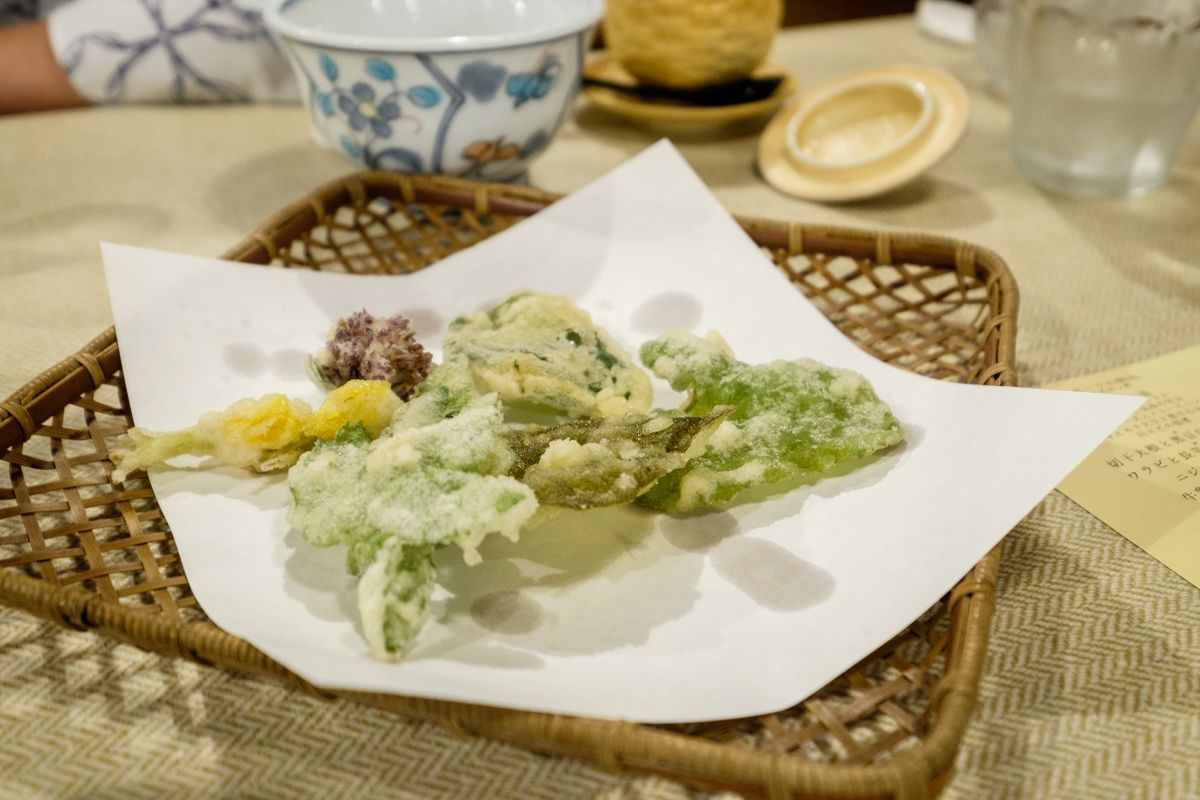 Vegetable Tempura served on a wicker tray
