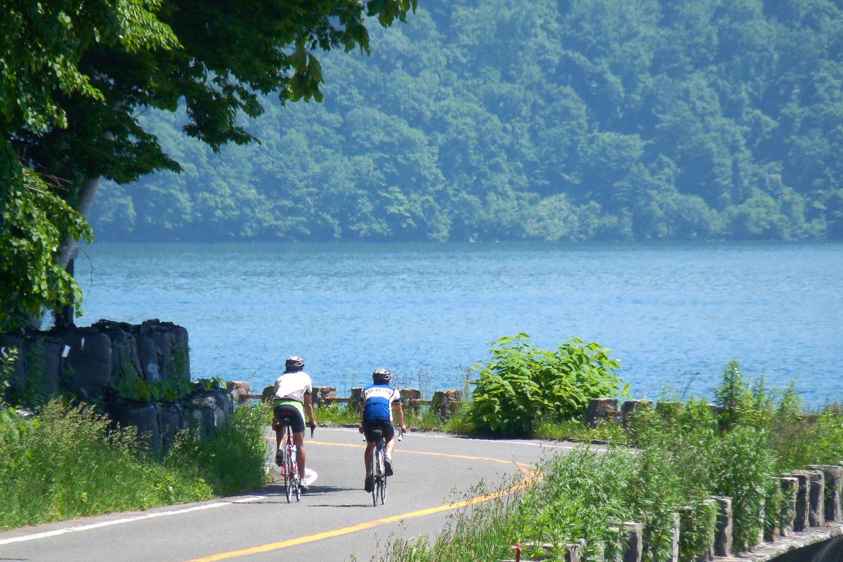 Lake Toya surrounded by lush green in early summer