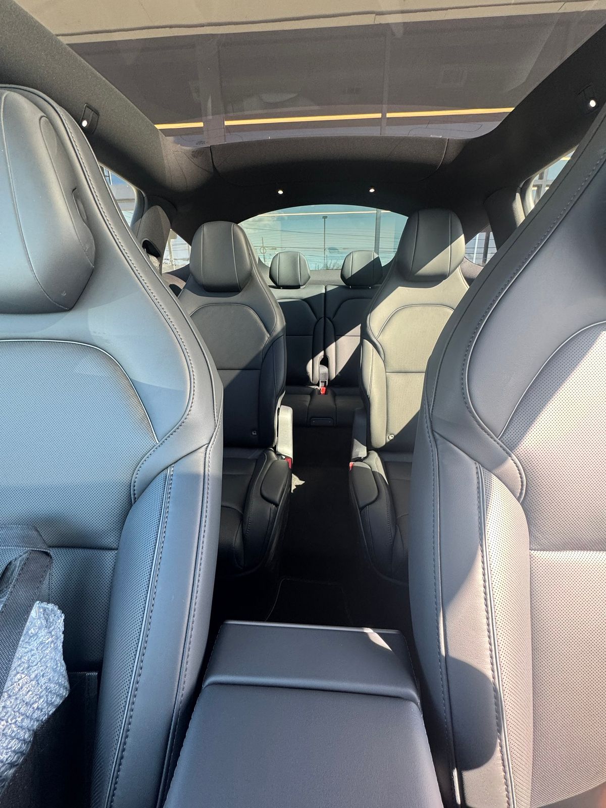 tesla model y l interior from driver