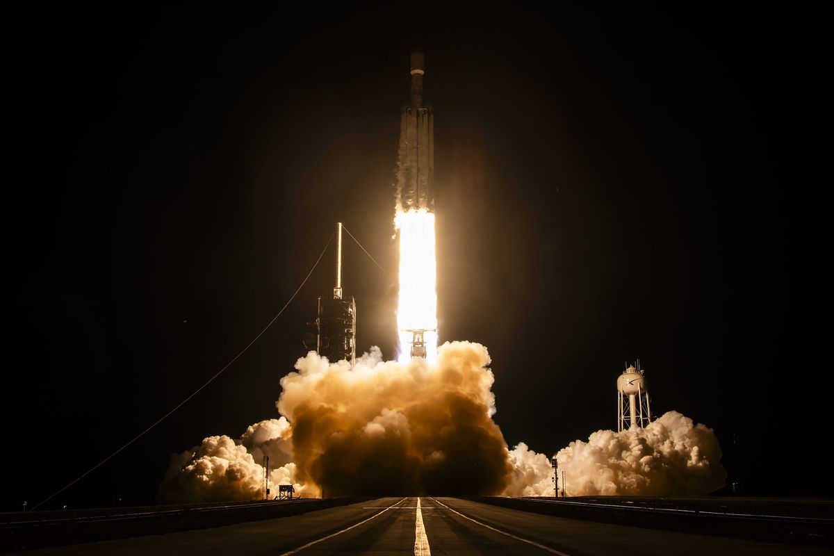 SpaceX's Falcon Heavy lifts off from Launch Complex 39A at NASA's Kennedy Space Center at 11:54 p.m. ET on October 1, 2026, carrying the classified NROL-97 mission for the National Reconnaissance Office. (Credit: SpaceX)