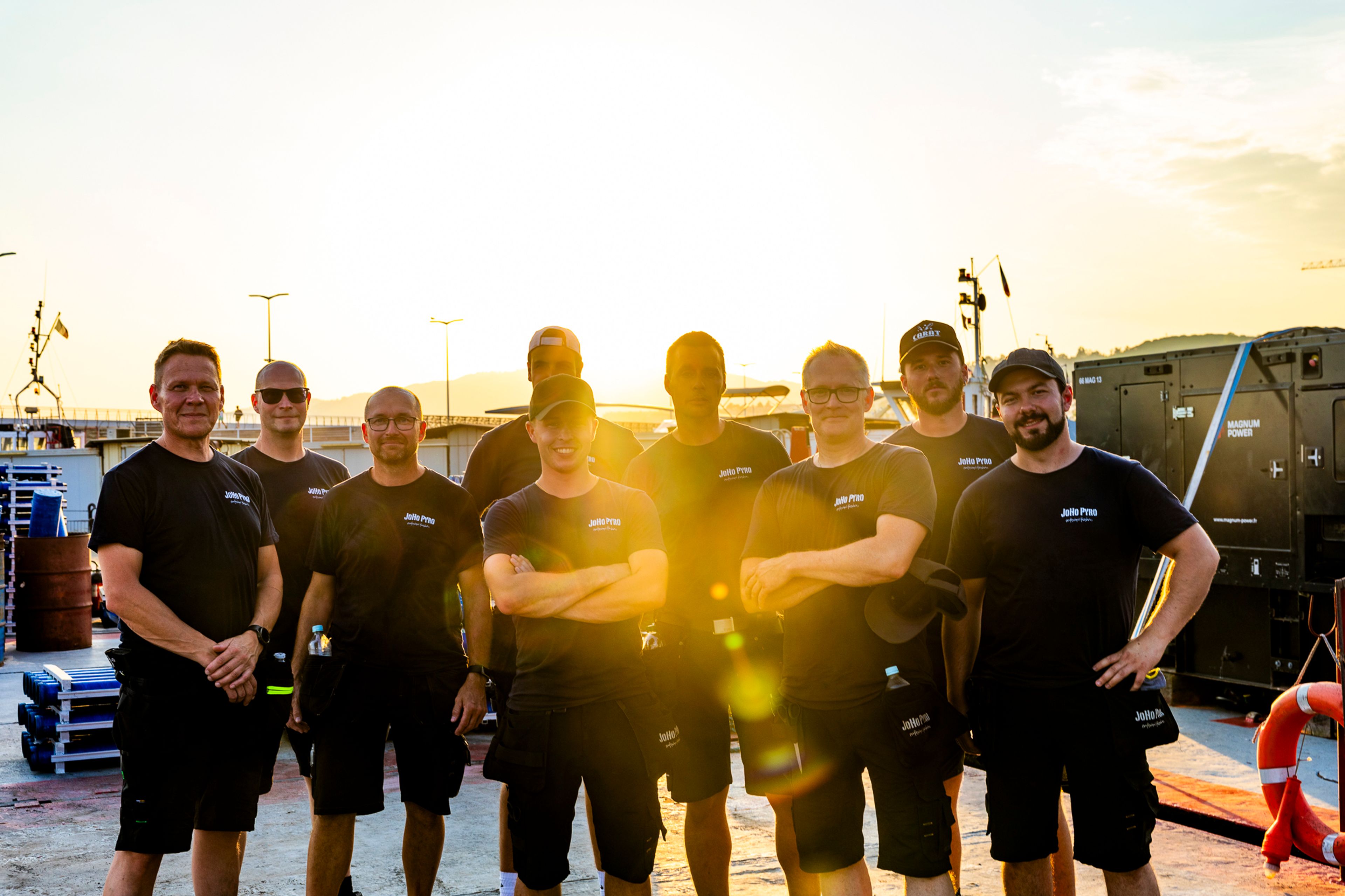 The JoHo Pyro team together on the quay in Cannes, in the setting sun.