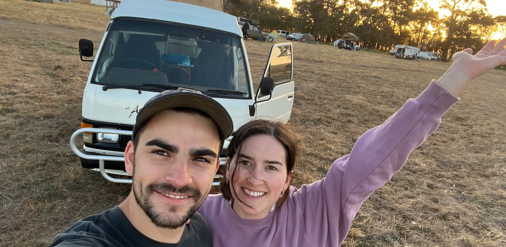 Ted and Ruby outside of their van 'Poppy'