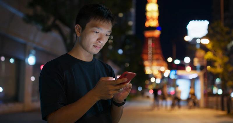Smartphone showing app tracking permission prompt — iOS ATT context