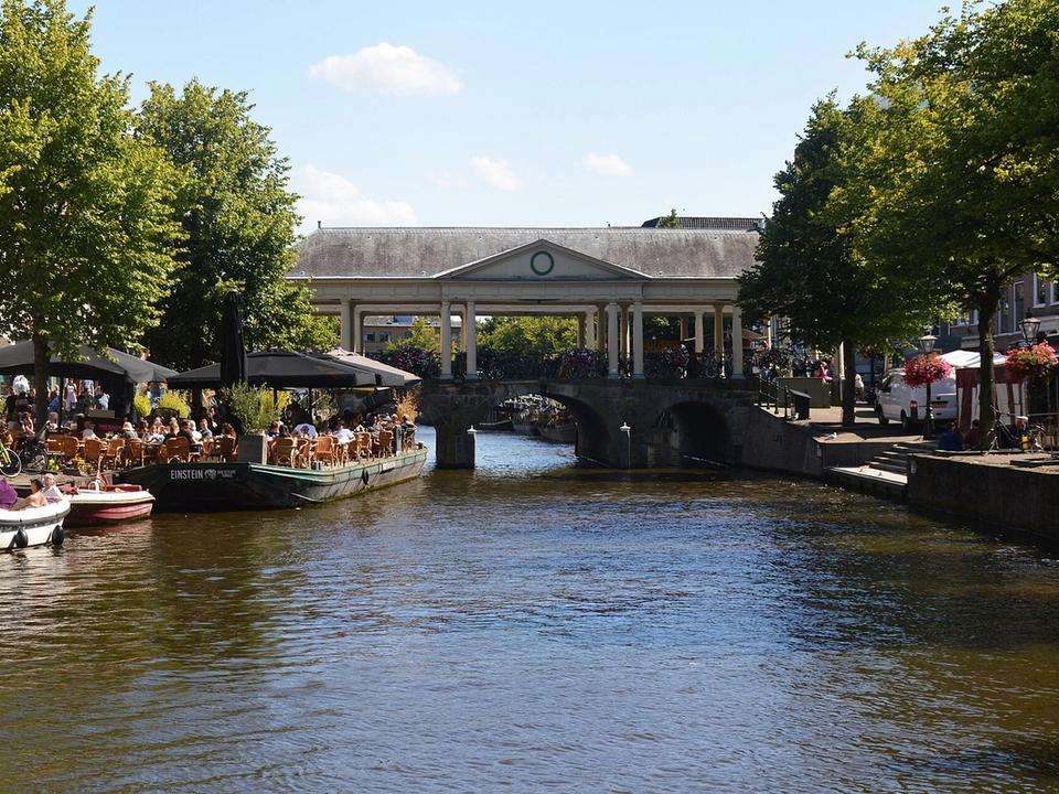 The Nieuwe Rijn canal in central Leiden with the Koornbrug bridge and gabled canal houses