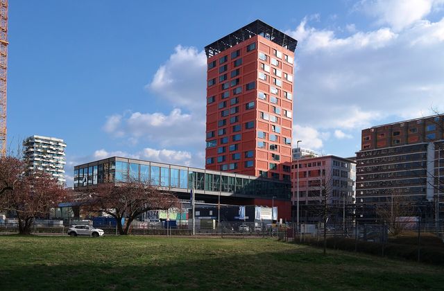 New residential towers under construction in the Strijp-S district of Eindhoven, with the Trudo tower and the Haasje Over building in view