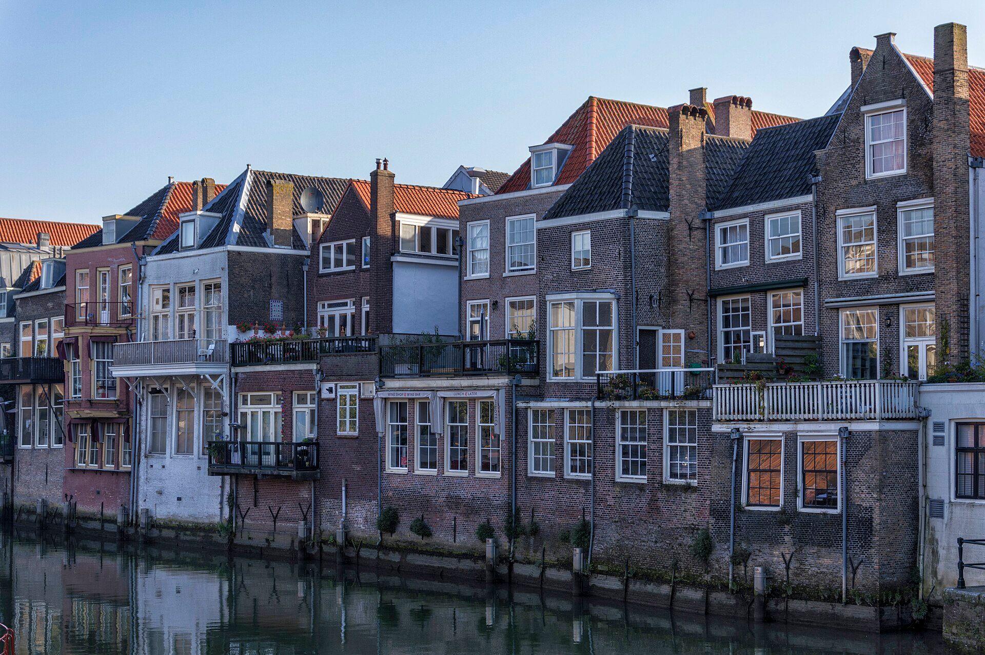 Historic canal houses backing directly onto the Voorstraathaven in Dordrecht's city centre