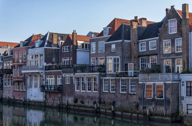 Historic canal houses backing directly onto the Voorstraathaven in Dordrecht's city centre