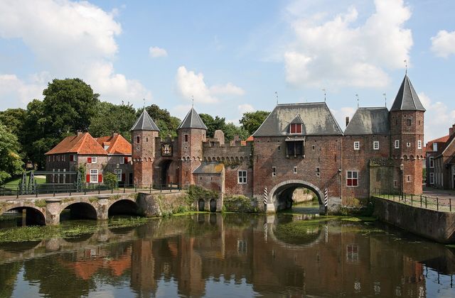 The Koppelpoort, Amersfoort's combined land and water gate, reflected in the river Eem