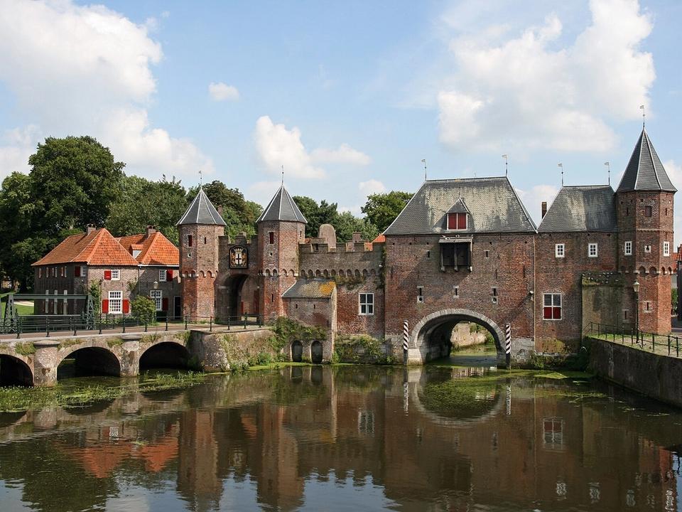 The Koppelpoort, Amersfoort's combined land and water gate, reflected in the river Eem