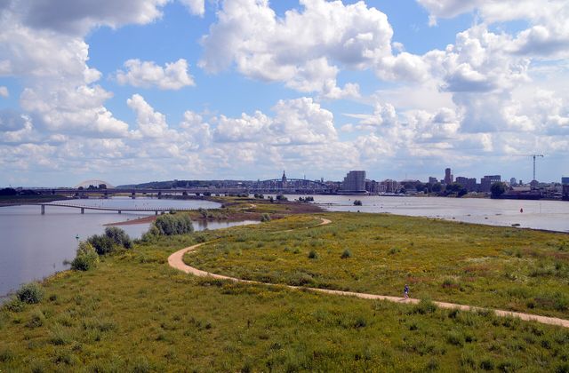 Skyline of Nijmegen along the river Waal, with the city rising behind the waterfront