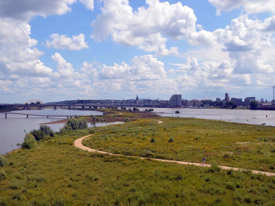 Skyline of Nijmegen along the river Waal, with the city rising behind the waterfront