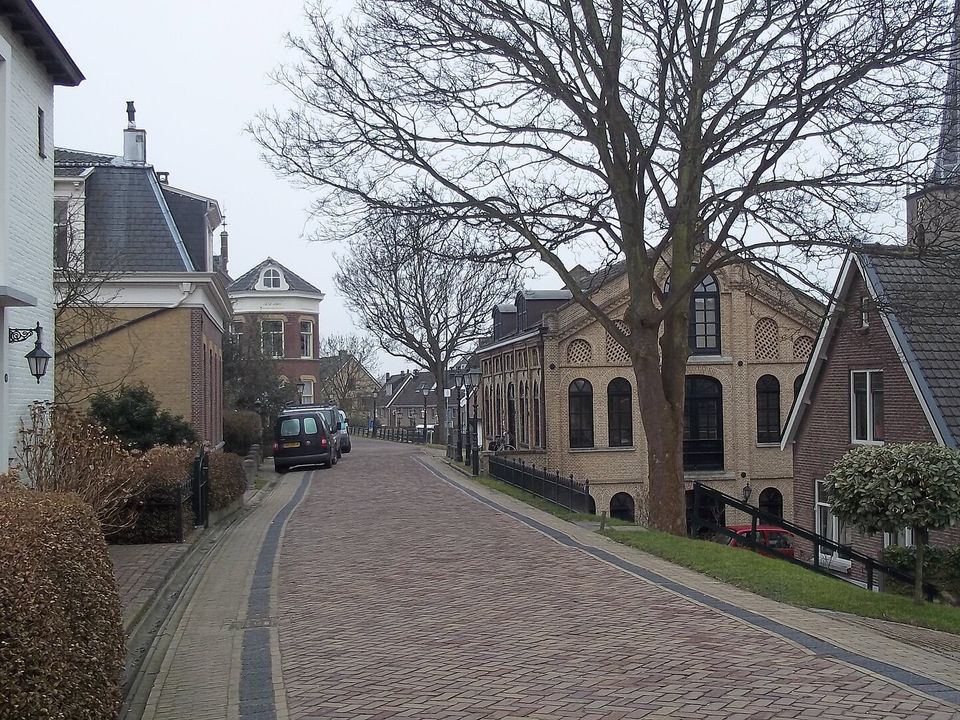 Waterway along the Hoogendijk near the centre of Capelle aan den IJssel with homes along the banks